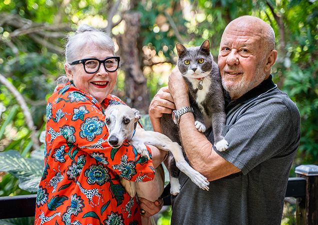 Jenny and David with their cat and dog.